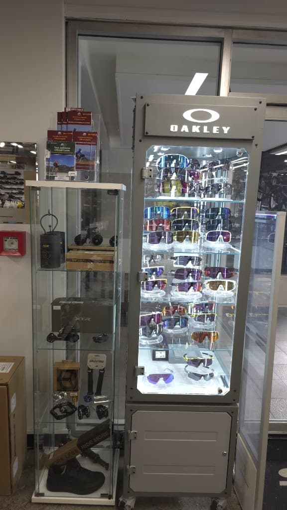 Oakley sunglasses cabinet in the Pedal Project shop